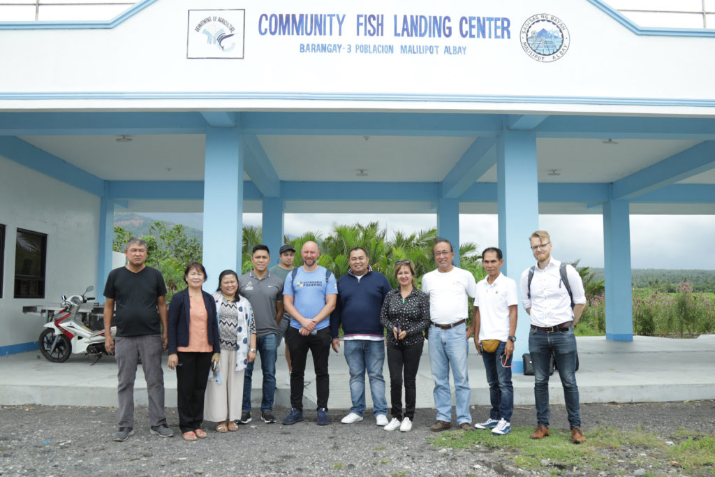 The Tracey team at the Community Fish Landing Center in Malilipot, Philippines.